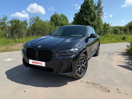 2021 BMW X4 30i II (G02) Рестайлинг, чёрный, вид 1