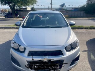 2012 Chevrolet Aveo II, серебристый, 717000 рублей, вид 1