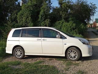 2010 Toyota ISis I Рестайлинг, белый, 1500000 рублей, вид 3