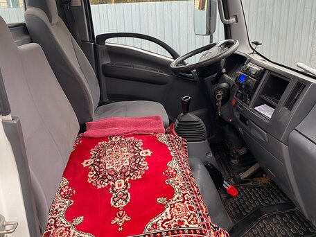 2012 Isuzu Elf (N-series), белый, 2630000 рублей, вид 4