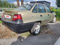 2010 Daewoo Nexia I Рестайлинг, бежевый, 299000 рублей