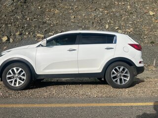 2015 Kia Sportage III Рестайлинг, белый, 2150000 рублей, вид 5