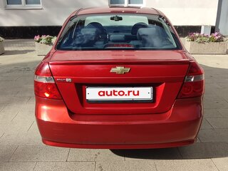 2010 Chevrolet Aveo I Рестайлинг, красный, 340000 рублей, вид 4
