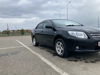 2009 Toyota Corolla Axio X (E140, E150) Рестайлинг, чёрный, 800000 рублей, вид 1
