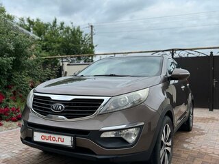 2010 Kia Sportage III, коричневый, 1200000 рублей, вид 1