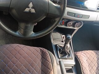 2010 Mitsubishi Lancer X, чёрный, 600000 рублей, вид 4