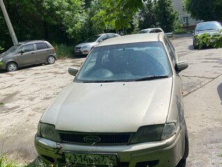 2001 Ford Laser IV, золотистый, 160000 рублей, вид 1
