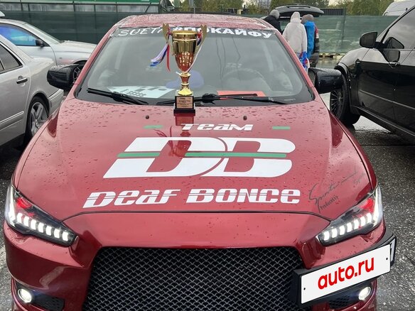 2010 Mitsubishi Lancer X, красный, 1399999 рублей - вид 24