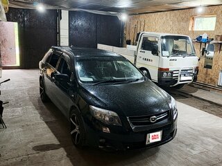 2010 Toyota Corolla Axio X (E140, E150) Рестайлинг, чёрный, 1100000 рублей, вид 1
