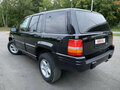 1996 Jeep Grand Cherokee I (ZJ) Рестайлинг, чёрный - вид 3