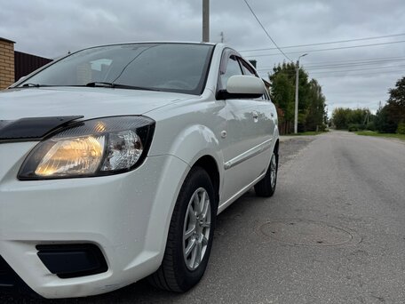 2011 Kia Rio II Рестайлинг, белый, 425000 рублей, вид 2