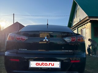 2013 Mitsubishi Lancer X Рестайлинг, чёрный, 900000 рублей, вид 2