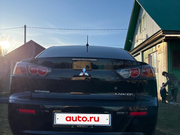 2013 Mitsubishi Lancer X Рестайлинг, чёрный, 900000 рублей - вид 1