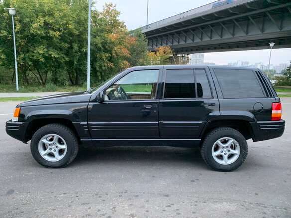 1996 Jeep Grand Cherokee I (ZJ) Рестайлинг, чёрный - вид 7