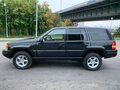 1996 Jeep Grand Cherokee I (ZJ) Рестайлинг, чёрный - вид 7
