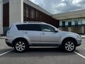 2010 Mitsubishi Outlander II Рестайлинг, серебристый, 1550000 рублей - вид 2