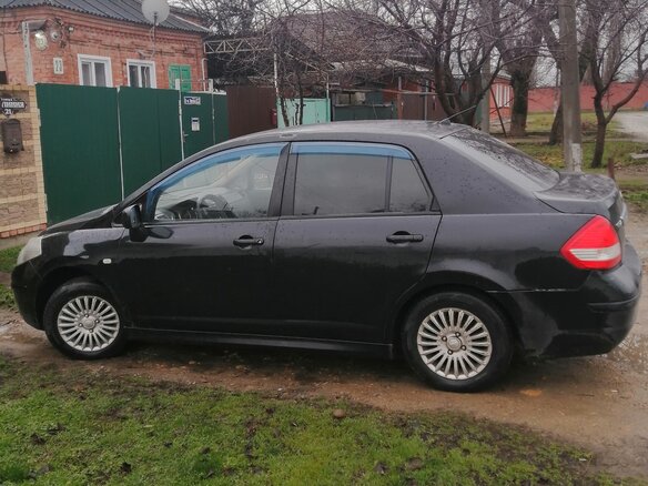 2011 Nissan Tiida I Рестайлинг, чёрный, 580000 рублей - вид 2
