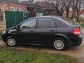 2011 Nissan Tiida I Рестайлинг, чёрный, 580000 рублей - вид 2