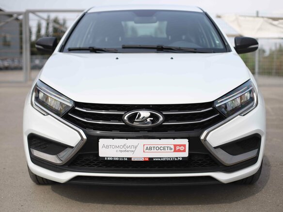 2024 Lada (ВАЗ) Vesta I Рестайлинг (NG), белый, 1120230 рублей - вид 1