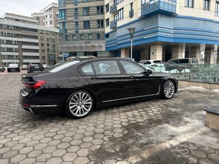 2019 BMW 7 серии Long 750Ld xDrive VI (G11/G12) Рестайлинг, коричневый, 7950000 рублей, вид 4