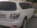 2011 Nissan Patrol VI (Y62), белый - вид 8
