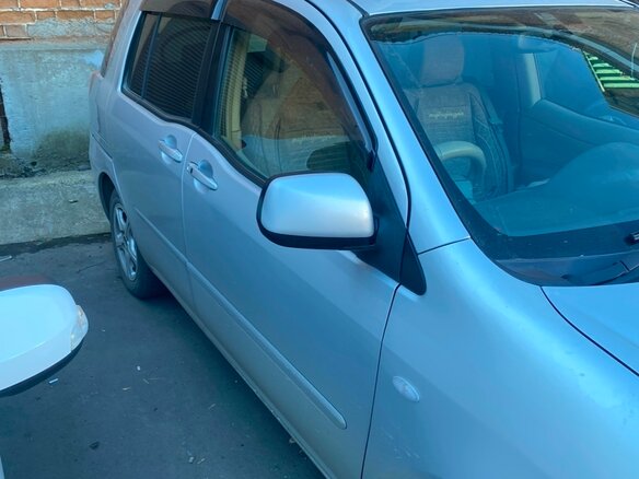 2010 Toyota Raum II, серый, 830000 рублей - вид 9