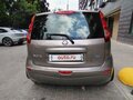 2010 Nissan Note I Рестайлинг, коричневый, 650000 рублей - вид 5