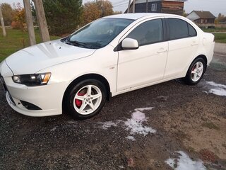 2013 Mitsubishi Lancer X Рестайлинг, белый, 749000 рублей, вид 2