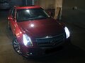 2009 Cadillac CTS II, пурпурный - вид 1
