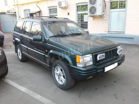 1998 Jeep Grand Cherokee I (ZJ) Рестайлинг, зелёный - вид 3
