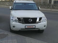 2011 Nissan Patrol VI (Y62), белый - вид 5