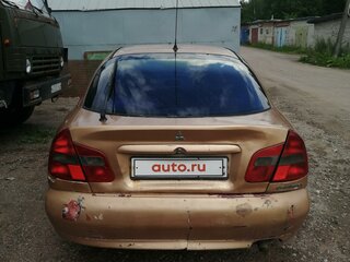 1999 Mitsubishi Carisma I Рестайлинг, золотистый, 200000 рублей, вид 3