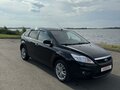 2009 Ford Focus II Рестайлинг, чёрный, 685000 рублей - вид 1