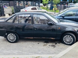 2011 Daewoo Nexia I Рестайлинг, чёрный, 115000 рублей, вид 2