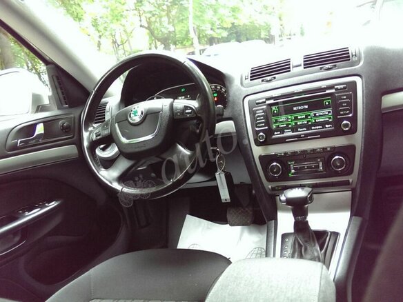 2011 Skoda Octavia II (A5) Рестайлинг, коричневый - вид 3