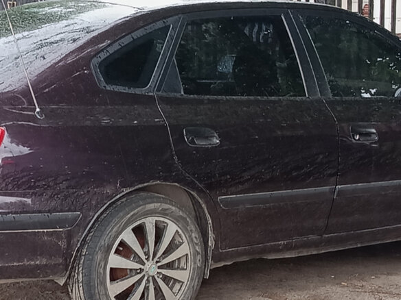 2006 Hyundai Elantra III (XD2) Рестайлинг, пурпурный - вид 1