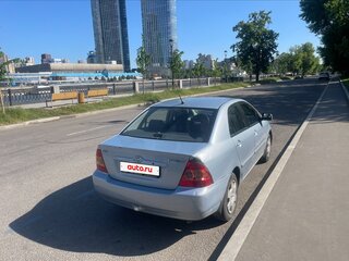 2004 Toyota Corolla IX (E120, E130) Рестайлинг, голубой, 420000 рублей, вид 3