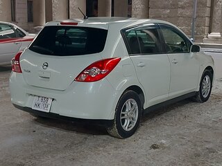 2010 Nissan Tiida I, белый, 740000 рублей, вид 3