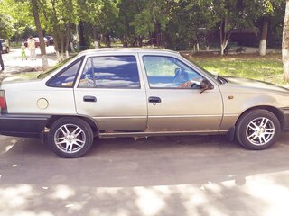 2001 Daewoo Nexia I, коричневый, 75000 рублей, вид 2