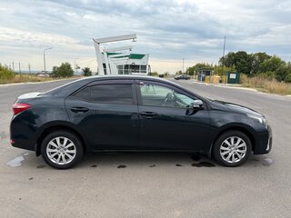 2013 Toyota Corolla XI (E160, E170, E180), чёрный, 1300000 рублей, вид 4