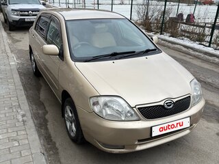 2002 Toyota Corolla Runx IX (E120, E130), бежевый, 560000 рублей, вид 1