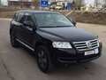 2005 Volkswagen Touareg I, чёрный - вид 1