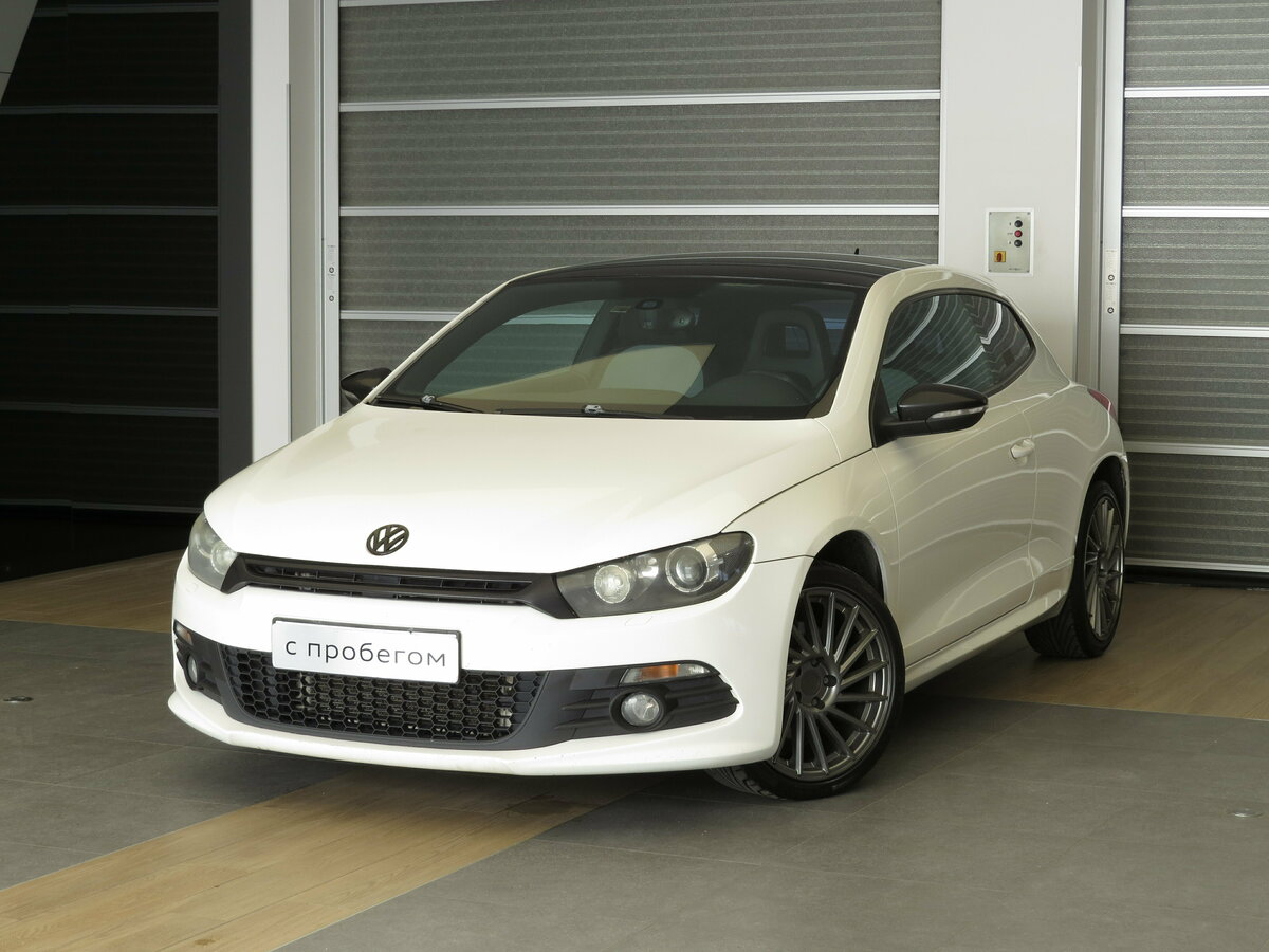 Открыть фотографии: Volkswagen Scirocco III