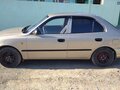 2006 Hyundai Accent ТагАЗ II, бежевый - вид 1