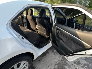 2014 Toyota Corolla XI (E160, E170, E180), белый, 1235000 рублей, вид 2