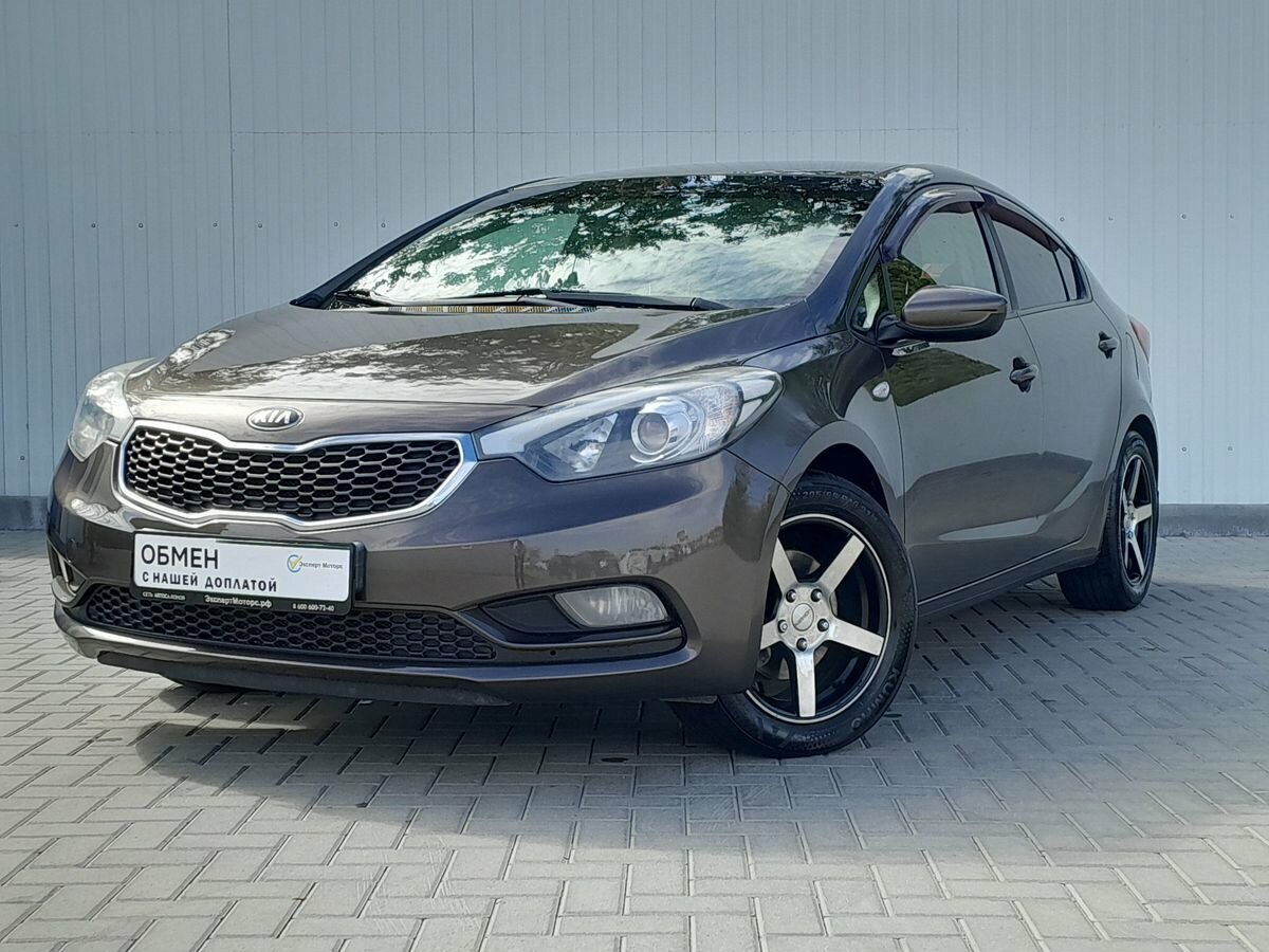 Открыть фотографии: Kia Cerato III
