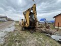 2001 Caterpillar 428, 2345678 рублей - вид 1