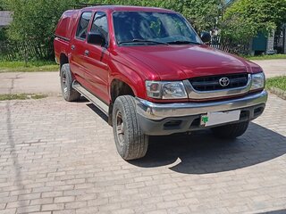 2004 Toyota Hilux VI Рестайлинг, красный, 1100000 рублей, вид 2