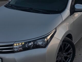 2013 Toyota Corolla XI (E160, E170, E180), серый, 1300000 рублей, вид 3