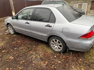 2006 Mitsubishi Lancer IX Рестайлинг, серебристый, 260000 рублей, вид 2
